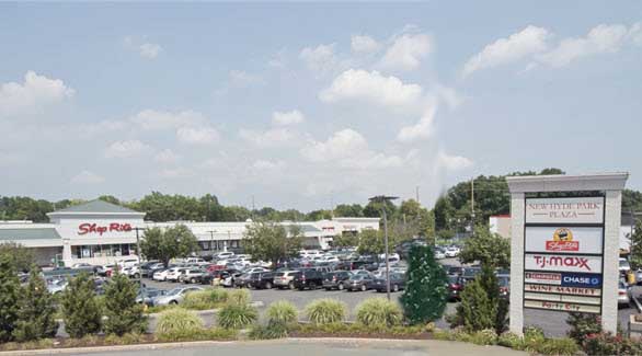 Retail shopping center with parking lot