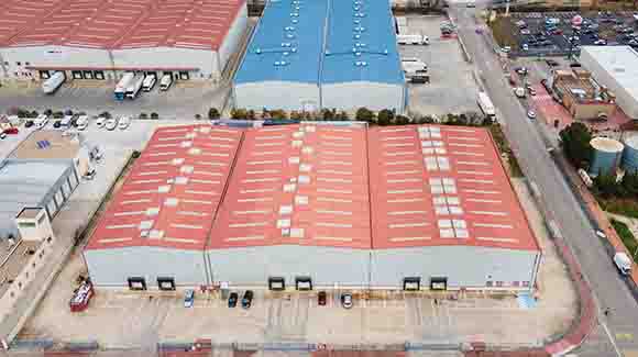 Green rooftop of a large logistics warehouse