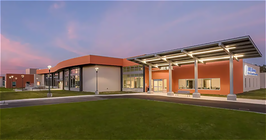 An outpatient medical building at sunset