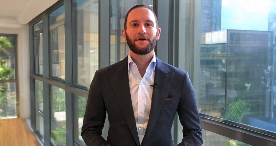 Thumbnail photo of Managing Director Josh Kane in an office building