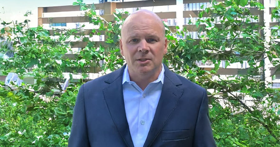 Photo of Rick Schaupp in front of New York City skyline