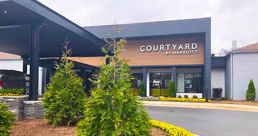 Exterior entrance to remodeled Courtyard by Marriott hotel