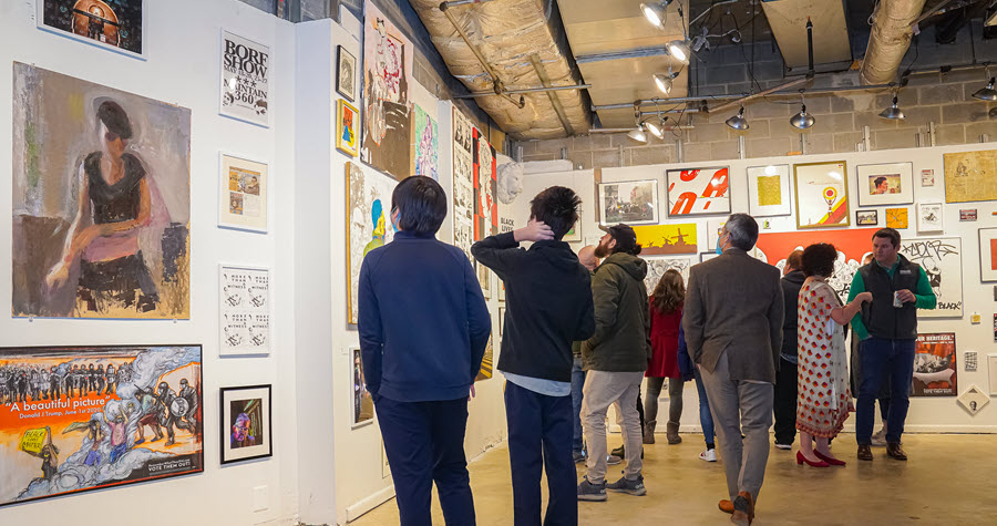 A room full of guests at the Robin Bell Art Exhibition at Chevy Chase Pavilion