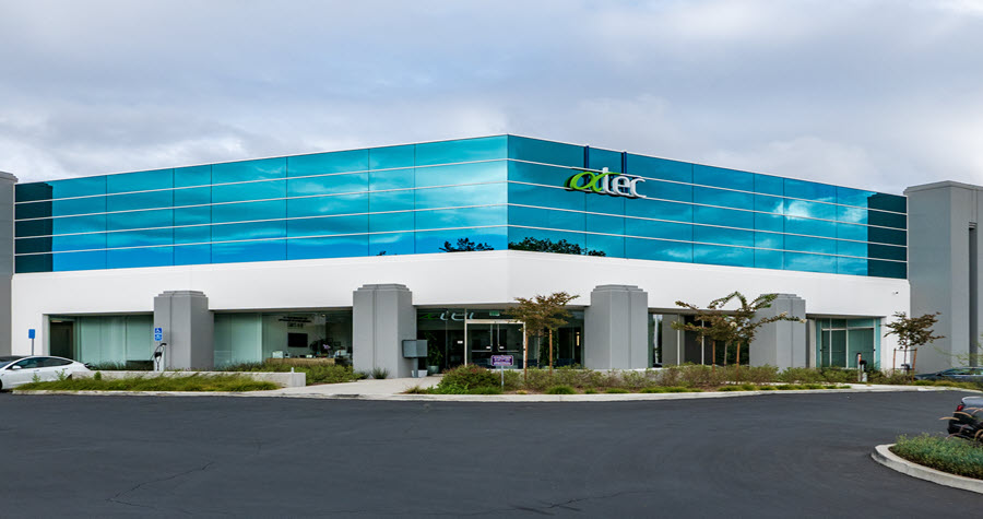 Exterior of life sciences hq building and parking lot