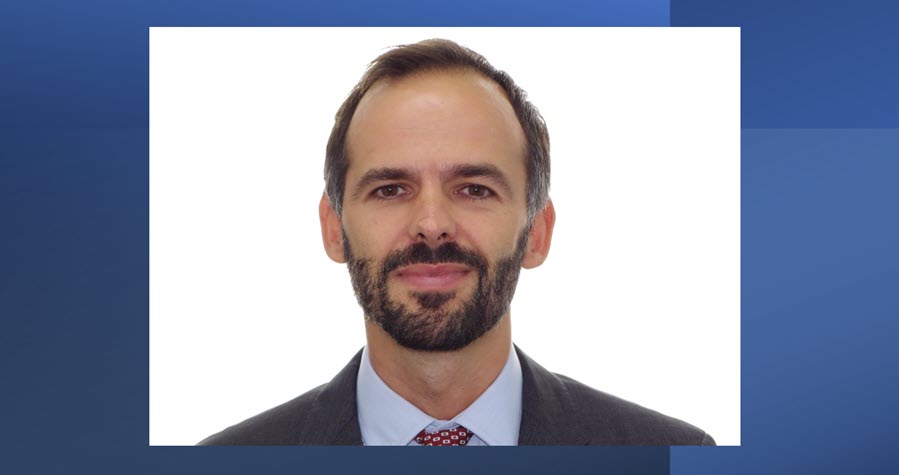 Headshot of Bruno Berretta in a suit and tie