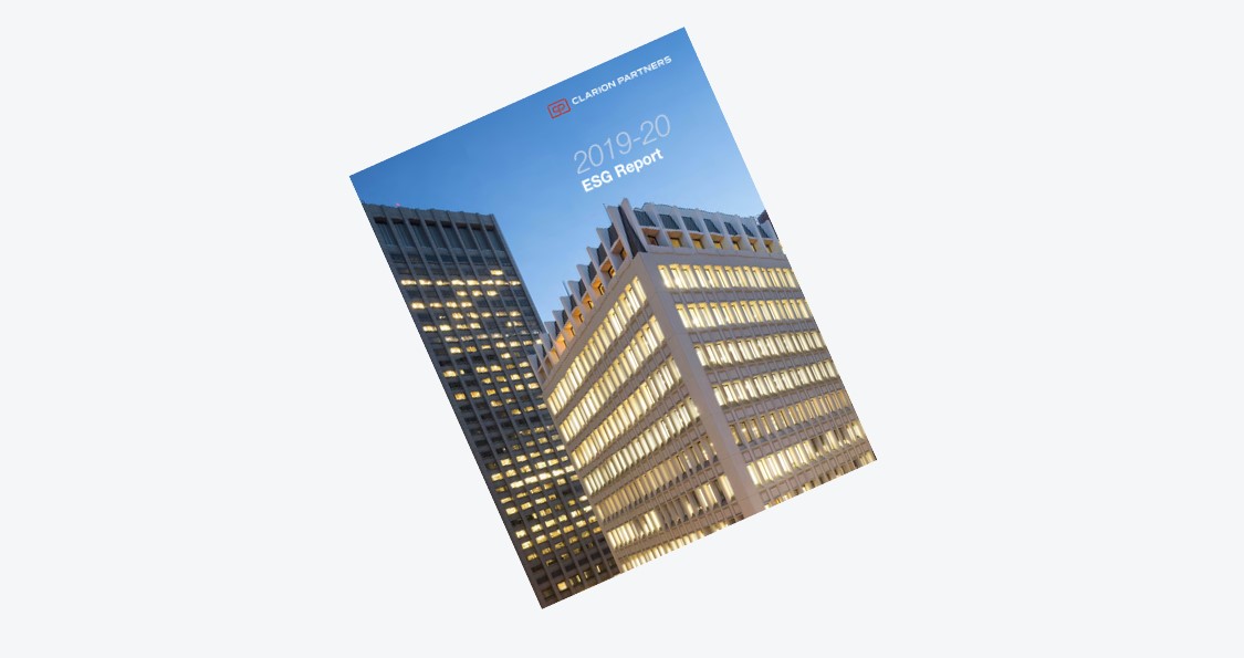 Annual Report featuring high-rise buildings at dusk and a blue sky