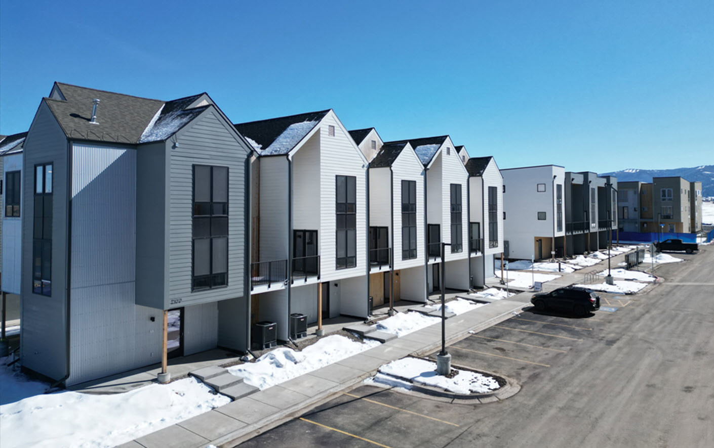snow covered multifamily property for opportunity zone investing section