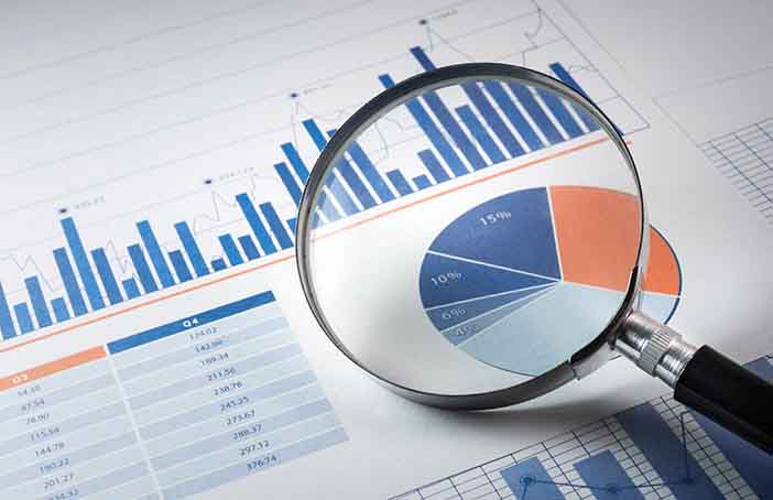 magnifying glass on a piece of paper