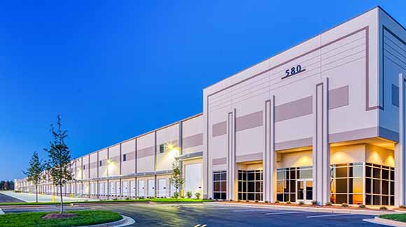 Corner of a distribution center with blue sky