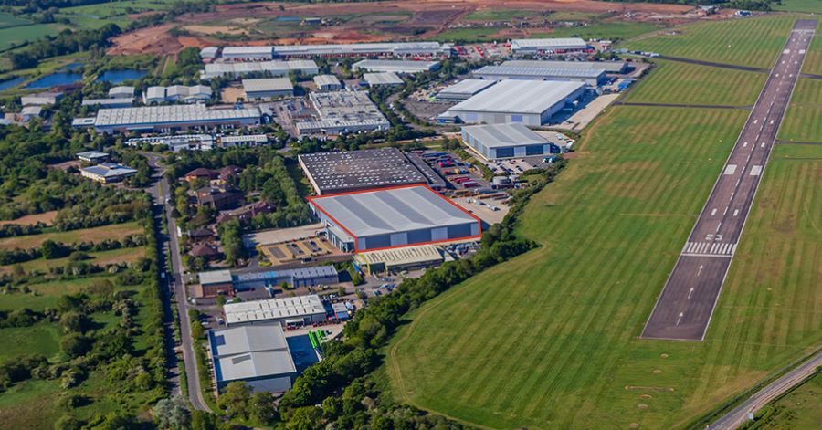 Large industrial property next to airfield