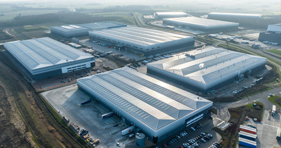 European logistics: Aerial shot of large industrial warehouses